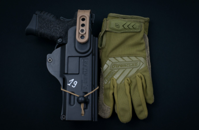 gun and gloves